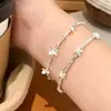Elegante Pulsera de Mariposa Plateada para Mujer 2026 Nuevo Modelo Lujo Ligero Nicho Exquisita Joyería de Pulsera de Gama Alta Venta al Por Mayor