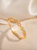 Pulsera Cruzada Europea y Americana de Cobre Incrustado con Circonio Estilo Cubo de Azúcar Chapada en Oro de 18K Joyería Estilo Correa de Reloj