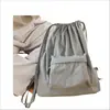 Mochila impermeable de cordón de nailon, gran capacidad, ligera, adecuada para estudiantes, desplazamientos, deportes, fitness y viajes, con diseño de cordón