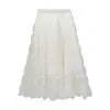 Elegante falda de malla de poliéster de Taiwán de color liso con pliegues de burbuja y borde de volantes para mujer, nuevo estilo de principios de otoño, elegante y adecuada para ir al trabajo, falda de volantes con dobladillo amplio