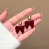 Pendientes rojos de Año Nuevo para mujer, otoño e invierno, con lazo, con clip para las orejas, nuevos pendientes de perla de Año Nuevo 2024