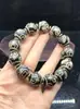 Venta al por mayor del fabricante Pulsera de cuentas Dzi de Xizang 16 mm Negra y Blanca Dzi Weathered B