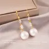 Nuevos Pendientes de Gancho con Perlas y Circonitas Estilo Chino, Lujo Ligero, Pendientes de Borla Modernos y Elegantes, Diseño de Nicho, Pendientes Versátiles al por Mayor