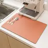 Tapete Drenante de Couro Absorvente de Água de Terra Diatomácea Transfronteiriço para Mesa de Cozinha Doméstica, Resistente a Manchas e Fácil de Cuidar, Pode Ser Personalizado e Enviado