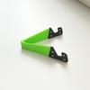 Soporte en forma de V para tableta de teléfono móvil, soporte universal de escritorio, soporte plegable triangular en forma de V, soporte perezoso para teléfono móvil al por mayor