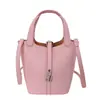 Bolso de Mano Pequeño Texturizado Transfronterizo para Mujer 2026 Nuevo Vintage Versátil Elegante Bolso Cubo para Viaje Diario Bolso de Hombro Único Bolso Cruzado