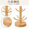 Estante para tazas de madera maciza de seis ganchos, diseñado para colgar y escurrir tazas, un organizador de encimera de cocina para el hogar hecho de madera