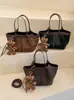 Bolso Cruzado de Hombro Cruzado Moda Estilo Coreano 2026 Otoño Bolso de Mano de Alto Valor con Temperamento Simple Bolso Tipo Cubo Elegante