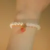 Pulseira de Jade Hetian Imitação Pêssego Design Nicho Feminino Estilo Ins Simples Pulseira de Ágata Vermelha do Sul