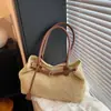 Bolsa de mano casual tejida de paja para mujer, nueva moda 2026 diseño calado, gran capacidad, bolso de axila de verano