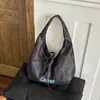 Bolso cruzado de estilo casual estampado para mujer, nuevo bolso de hombro de gran capacidad otoño 2026, bolso tote estudiantil moderno y versátil