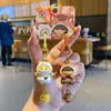 Colgantes de la serie de tocados lindos para mascotas auténticos, diseño original adorable de mascota, llavero con cadena para teléfono a presión