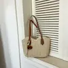 Bolso de paja con borlas transfronterizo, nuevo bolso tejido de paja, bolso de playa para vacaciones, bolso de hombro versátil, bolso tote de verano para el día a día
