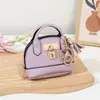 Nuevo Llavero Mini Bolso de Concha Portátil para Guardar Labial Auriculares Bolsita Colgante de Monedero de Mano