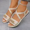 Sandalias planas para mujer de talla grande para el verano de 2026, con diseño de cadena metálica, color liso, tiras elásticas cómodas y adecuadas para uso en exteriores