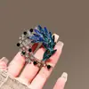 Broche de cauda de fênix de cristal de alta qualidade para mulheres, luxo leve, toque de alta qualidade, broche para terno suéter, presente para idosos, acessório de lapela grande