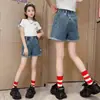 Shorts de Mezclilla para Niñas, Estilo de Verano de Moda, Pantalones para Niños Grandes, Logo de Cara Sonriente Casual de Verano para Niñas al por Mayor, Niños Pequeños y Medianos