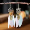 Pendientes de plumas atrapasueños retro creativos de 9 colores, pendientes étnicos con borlas para mujer, joyería al por mayor