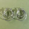 Nuevos Pendientes de Aro Grandes Elegantes y Versátiles con un Toque de Lujo Ligero y de Alta Gama, Brazaletes para Oreja Femeninos, Pendientes de Aro Lisos Únicos, Aretes