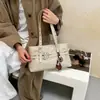 Bolso de mano retro estilo commuter color marrón Melard para mujer, nuevo modelo de moda 2026 de gran capacidad, bolso tote de alta gama
