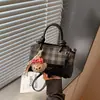 Bolsa de Mão Xadrez Transfronteiriça para Mulheres 2026 Nova Tendência Moda Bolsa de Ombro Verão Bolsa Balde Transversal para o Dia a Dia
