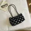 Bolso japonés textura simple bolso de hombro individual coreano gran capacidad 2026 nuevo otoño gamuza axila exquisito