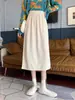 Nueva Falda de Pana Otoño e Invierno 2023 para Mujer Cintura Alta Adelgazante de Longitud Media Falda Línea A Moda Estilo Coreano Falda de Cadera