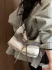 Bolso de mujer de alta gama transfronterizo, nuevo modelo verano 2026, bolsa de tela versátil casual de gran capacidad, bolso tipo cubo de un solo hombro cruzado