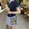 2025 Nuevo Estilo Moda Diseño Hoja de Bambú Fresca Axila Hombro Único Cruzado Estilo Textura Mariposa Bolso Cruzado