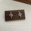 Aretes de serpiente de metal con diamantes completos de personalidad nicho para mujer, diseño elegante de alta gama de lujo ligero, aretes exagerados europeos y americanos