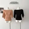 Top de lyocell estilo francés con hombros descubiertos y mangas acampanadas