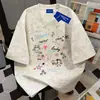 Camiseta Corta de Manga Corta con Estampado de Grafiti Sencillo de Marca de Moda para Pareja para Mujer 2026 Primavera/Verano Casual Ins Algodón Pesado Superior para Hombre