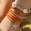 Tobillera trenzada con cuentas de concha estilo resort bohemio transfronterizo Tobillera de cuentas de arroz con estrella de mar estilo playa Juego de siete piezas