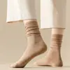 Calcetines para mujer primavera y otoño Cuatro Estaciones calcetines de media pantorrilla color liso desodorantes absorbentes de sudor estilo ins japonés calcetines de rizo para confinamiento venta al por mayor