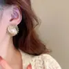 Pendientes de perlas de fuegos artificiales exagerados personalizados estilo coreano diseño suave y elegante lujo ligero retro moda única joyería para orejas