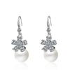 Brincos de pérolas temperamento feminino Coreia do Sul brincos longos de zircônia com flores doces brincos simples atacado