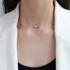 Gargantilla de personalidad europea y americana, diseño de nicho ligero de lujo, cadena plana en forma de S, acero de titanio, oro de 18 quilates, collar de clavícula con pequeño grano de oro