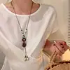 Collar de Cuerda Trenzada con Borla de Anillo de Madera Bohemio Cadena de Suéter Tejida a Mano Zen Antigua Accesorios de Nicho Personalizados