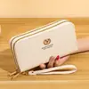Nueva cartera larga de estilo coreano para mujer con doble cremallera, bolsa para teléfono de gran capacidad, monedero de cuero moderno y simple con múltiples ranuras para tarjetas, para llevar en la mano