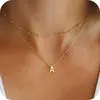 Amazon Transfronterizo Nuevo Collar de 26 Letras Multicapa Colgante Pequeño Cadena de Perlas de Arroz Joyería de Moda para Mujeres