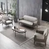 Conjunto de mesa de centro y sofá de oficina, traje de combinación, lujo ligero, simple, moderno, sala de recepción de negocios, combinación de sofá de cuero