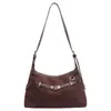 Bolsa de mano retro de gran capacidad para mujer, nueva moda 2026, bolso de hombro de nicho para el trabajo, bolso cruzado casual para el hombro