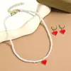 Joyería transfronteriza de San Valentín más vendida Aretes de flor de rosa roja Collar de corazón Conjunto Aretes de San Valentín europeos y americanos