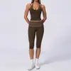 Camisola de yoga estilo europeo y americano con cuello halter de tacto desnudo, tipo dos piezas falsas, adelgazante y levantadora de glúteos, adecuada para deportes casuales y fitness