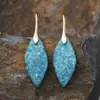 Nuevos pendientes colgantes de hojas de piedra natural bohemios europeos y americanos de moda, joyería retro de estación independiente transfronteriza.