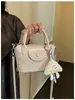Bolsa Feminina 2026 Chegada Nova de Verão Design de Nicho Versátil Moda Textura Exquisita Pequena Bolsa Quadrada Bolsa de Ombro Transversal Estilo Coreano