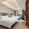Muebles de Hotel de la Ciudad de Jinjiang Habitación Estándar Juego Completo de Camas Dobles para Casas de Huéspedes, Camas Específicas para Hotel, Fábrica de Muebles para Habitaciones Modelo de Renovación