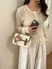 Bolsa Pequena Simples de Mão Estilo Coreano para Mulheres 2026 Nova Versátil Moda Bolsa Cambridge Nicho Elegante Bolsa Transversal para o Dia a Dia