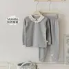 Conjunto de Pijama Infantil con Estampado Completo de Conejo Panadero Otoño 2026, Nuevo Top y Pantalones de Lana Elástica de Cuello Redondo para el Hogar Otoño-Invierno