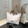 Bolso de mano sencillo de estilo occidental de gran capacidad para mujer, bolso de hombro informal de nueva moda 2025, bolso de hombro ligero.